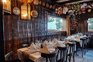 Cozy interior of the La Casserole restaurant in Courchevel