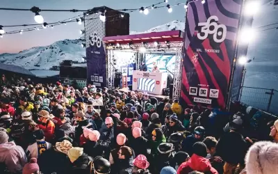 Large crowd of people at an apres-ski party at Le 360 bar in Val Thorens