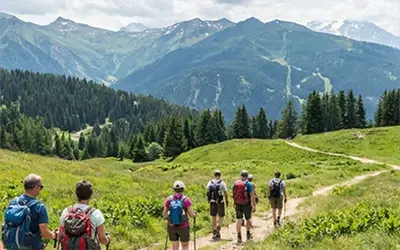 A group of hikers on the mountain trails in Courchevel