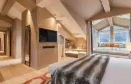 Penthouse Suite master bedroom under the roof beams, Hotel Mont-Blanc Chamonix