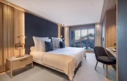 The bedroom in Suite-Chalet K6 at Le K2 Palace, Courchevel 1850