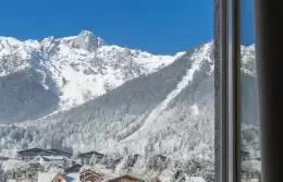 Snowy Brevent mountainside seen from a Prestige Plus Room window, Hotel Mont-Blanc Chamonix