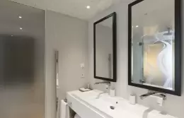 Bathroom with double vanity in an air-conditioned Prestige Room, Hotel Mont-Blanc Chamonix