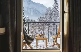 Balcony breakfast table facing a snowy forest, Junior Suite Mont-Blanc, Hotel Mont-Blanc Chamonix