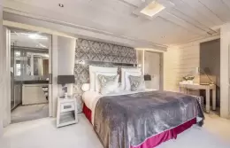 The bed in a Petite Executive Room at Le K2 Altitude, Courchevel 1850