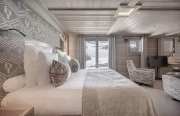 The bed in a Superior Room at Le K2 Altitude, Courchevel 1850