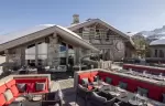 The terrace of Base Kamp by Ainata above the slopes at Le K2 Altitude, Courchevel 1850