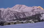 The chalet hamlet against the mountains at Le K2 Altitude, Courchevel 1850