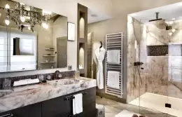 Prestige Suite bathroom with a glass shower and a stone vanity, Lys Martagon, Courchevel 1850