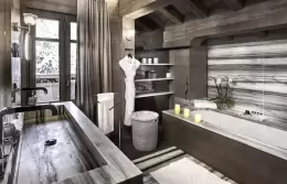 Deluxe Room 2 bathroom with a bathtub and a stone basin, Lys Martagon, Courchevel 1850