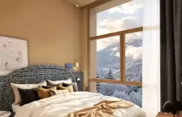 Deluxe Family Room with a large bed beside a window onto snowy firs at Barma, La Tania