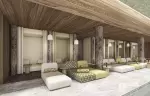 Spa relaxation area with day beds and tree-trunk pillars at Barma Hotel & Spa, La Tania