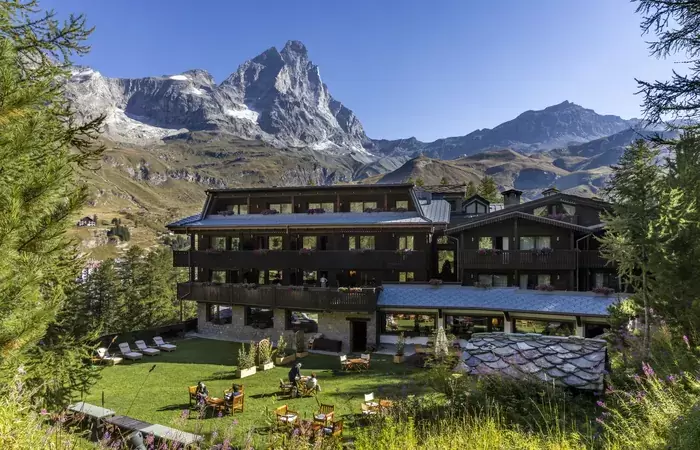 The hotel and its summer garden below the Matterhorn, Hotel Hermitage, Breuil-Cervinia