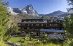 The hotel and its summer garden below the Matterhorn, Hotel Hermitage, Breuil-Cervinia