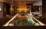 Loungers along the indoor pool in the private spa at No. 14 Verbier