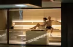 Two guests relaxing in the sauna of the chalet spa at No. 14 Verbier